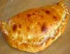 The name of this is 'calzone' and it is a pizza! Calzone: pizza closed on itself